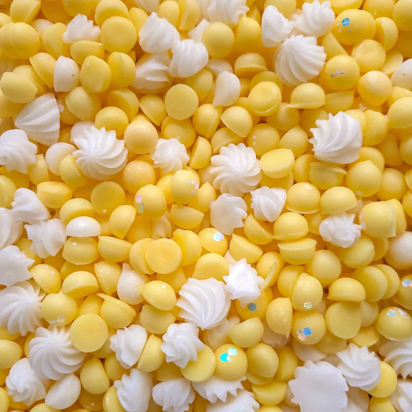 Yellow and white wax melts with a meringue design.