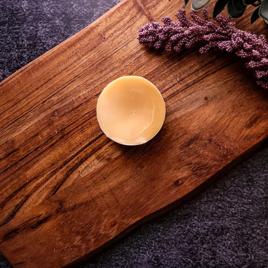 Vanilla Waffles Waxmelt on Wooden Surface with Purple Flowers