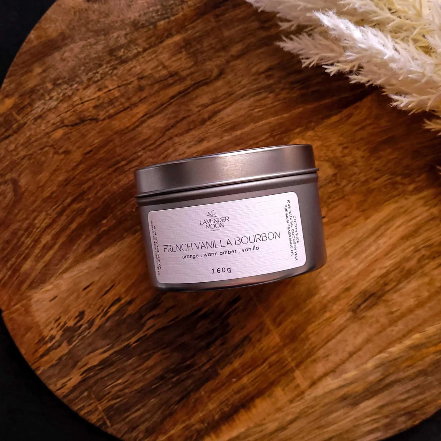 French Vanilla Bourbon Candle in tin, featuring coconut soy wax and cotton wick on a wooden surface.