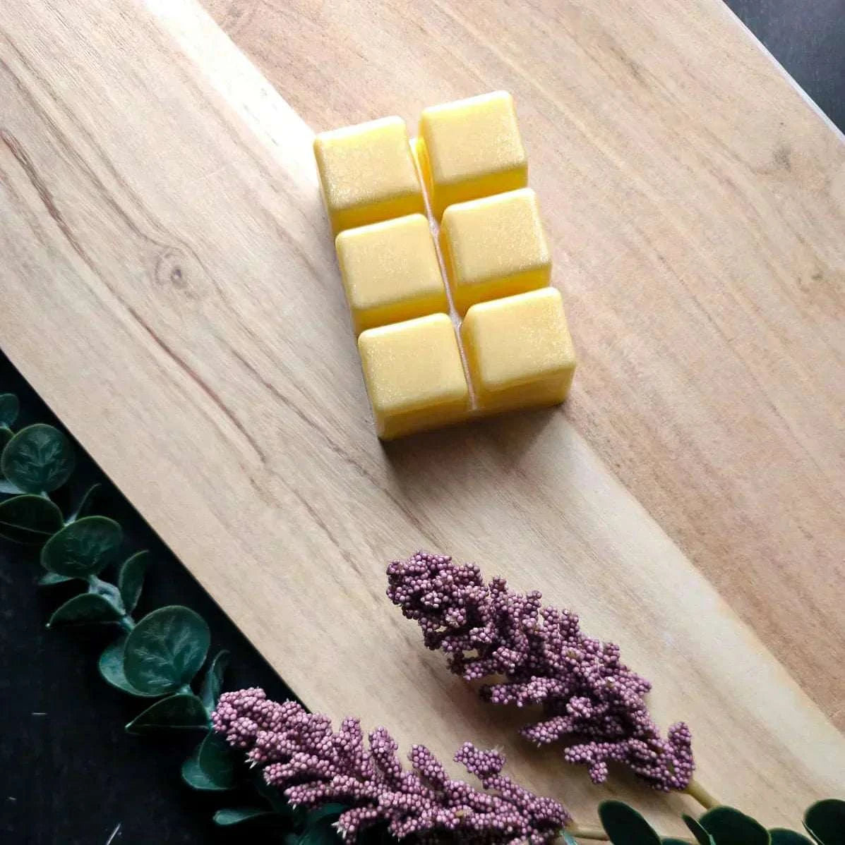 Vegan-friendly soy wax melt pack on wooden surface, discounted offer.