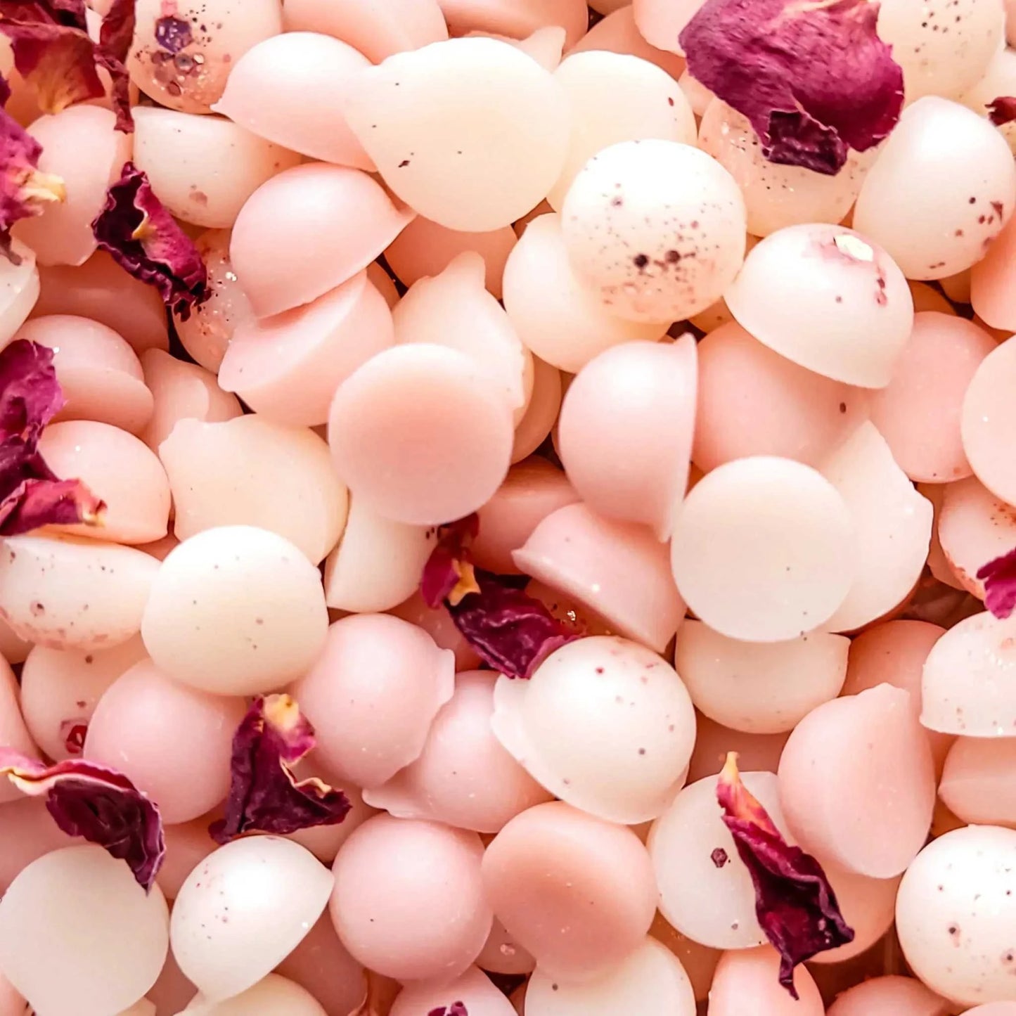 Lychee & Rose wax melts with dried rose petals, vegan-friendly soy wax blend.
