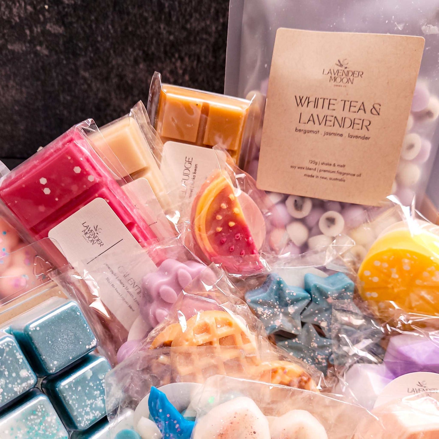 Mystery Melt Box with assorted soy wax melts including snapbars and novelty shapes.