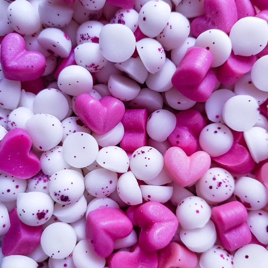 Pink and white heart-shaped Sakura wax melts for Valentine's collection.